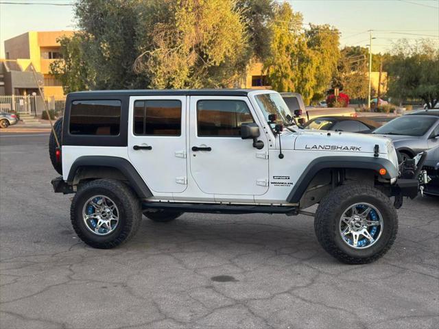 used 2016 Jeep Wrangler Unlimited car, priced at $18,550