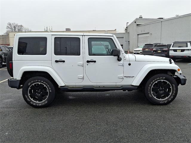 used 2012 Jeep Wrangler Unlimited car, priced at $17,017