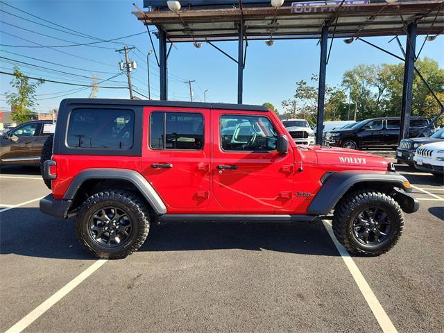 used 2023 Jeep Wrangler car, priced at $37,836