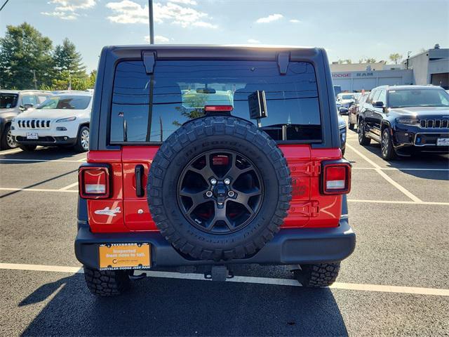 used 2023 Jeep Wrangler car, priced at $37,836