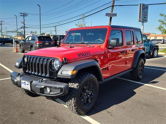 used 2023 Jeep Wrangler car, priced at $37,836