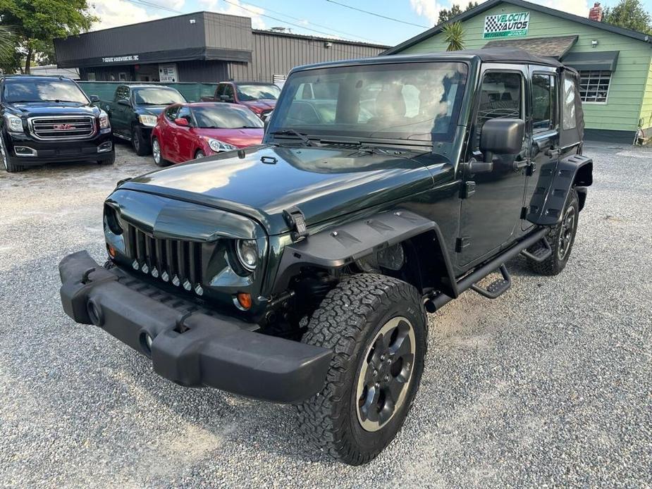 used 2011 Jeep Wrangler Unlimited car, priced at $12,900