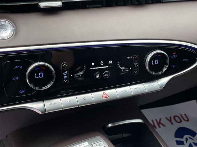 used 2023 Genesis GV70 car, priced at $42,813