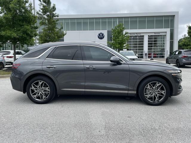 used 2023 Genesis GV70 car, priced at $42,813