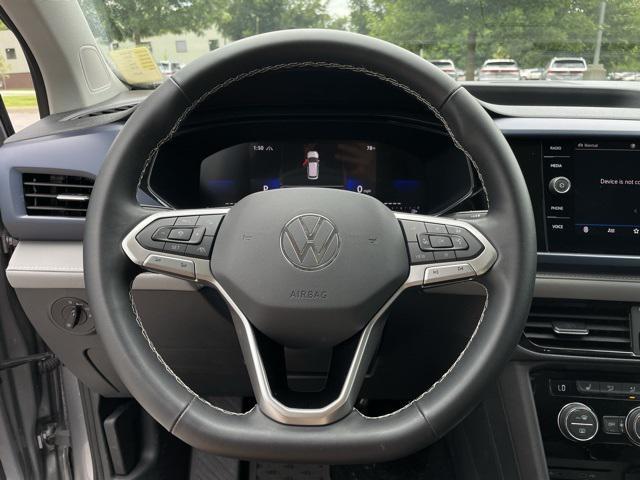 used 2024 Volkswagen Taos car, priced at $27,000