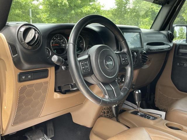 used 2015 Jeep Wrangler Unlimited car, priced at $20,523