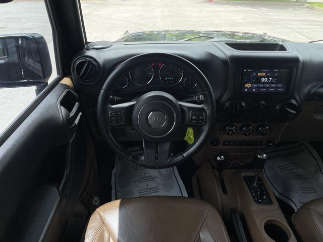 used 2015 Jeep Wrangler Unlimited car, priced at $20,523