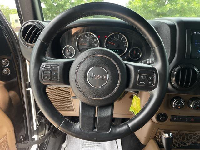 used 2015 Jeep Wrangler Unlimited car, priced at $20,523