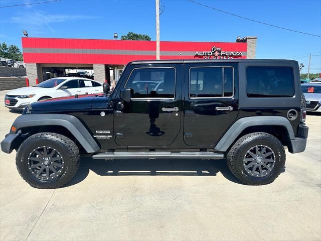 used 2014 Jeep Wrangler Unlimited car, priced at $18,952