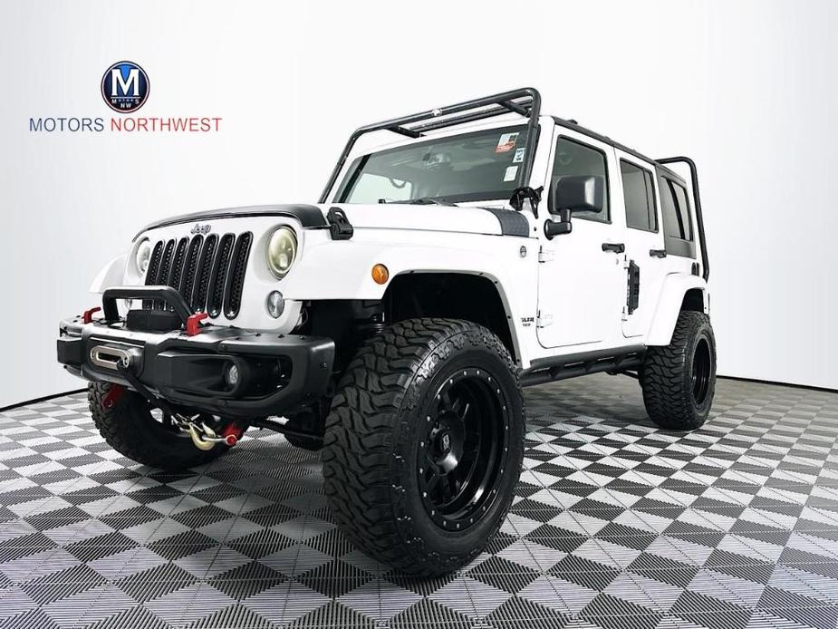 used 2015 Jeep Wrangler Unlimited car, priced at $21,995