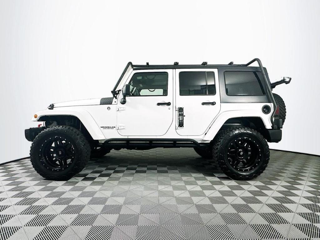 used 2015 Jeep Wrangler Unlimited car, priced at $19,995