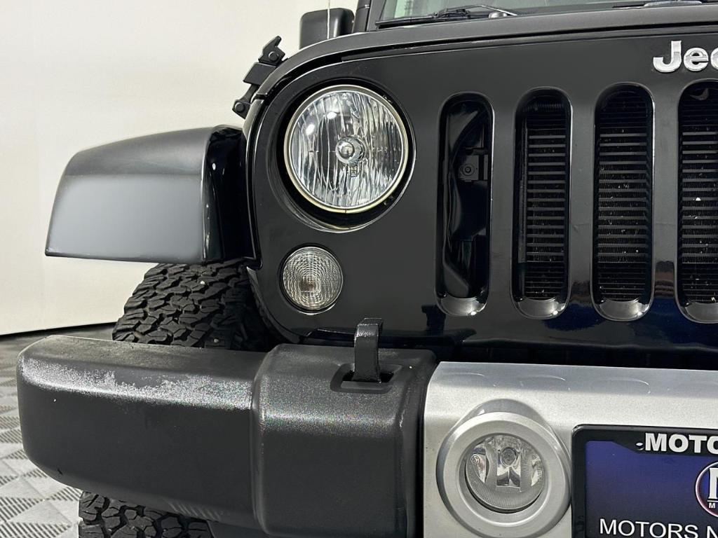used 2015 Jeep Wrangler Unlimited car, priced at $21,995