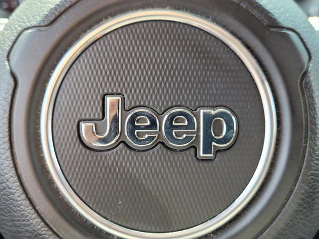 used 2021 Jeep Wrangler Unlimited car, priced at $39,808