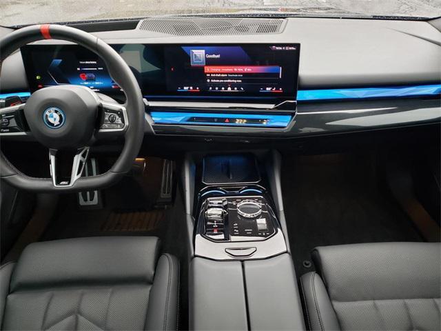 used 2024 BMW i5 car, priced at $57,995