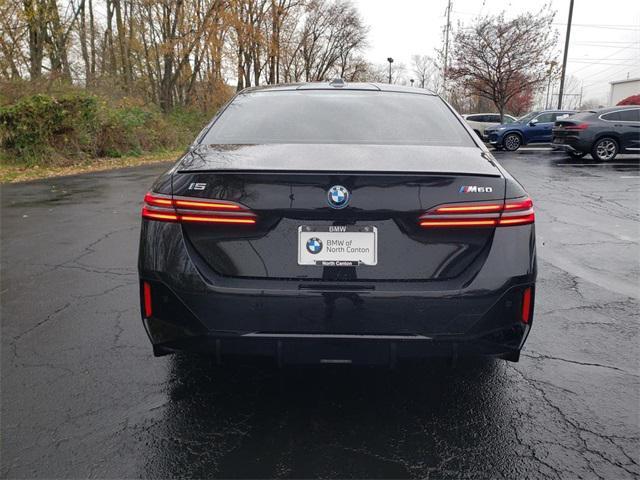 used 2024 BMW i5 car, priced at $57,995