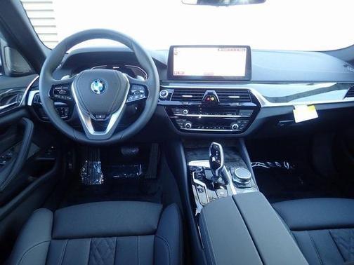 used 2023 BMW 530e car, priced at $52,995