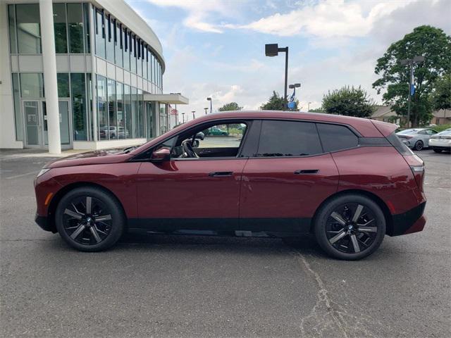 used 2024 BMW iX car, priced at $94,995