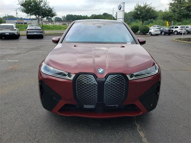 used 2024 BMW iX car, priced at $94,995