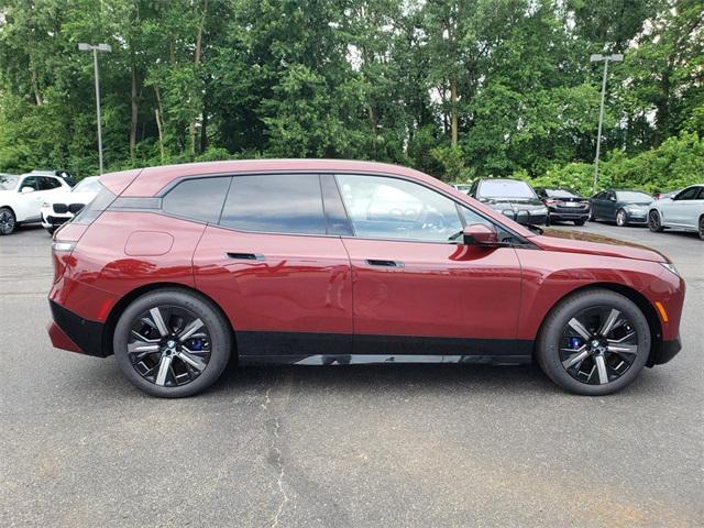 used 2024 BMW iX car, priced at $94,995