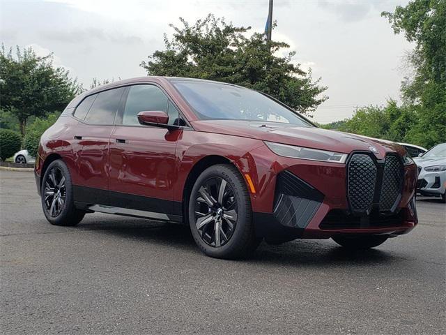 used 2024 BMW iX car, priced at $94,995