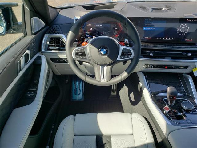 new 2025 BMW X6 M car, priced at $149,015