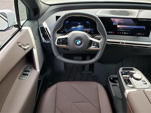 new 2026 BMW iX car, priced at $83,395