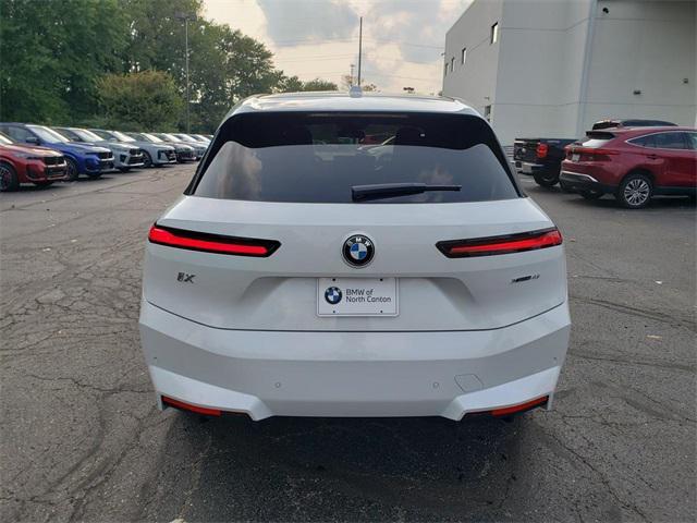 new 2026 BMW iX car, priced at $83,395