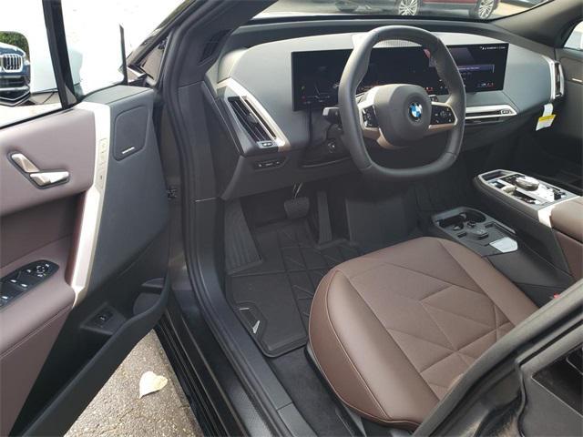 new 2026 BMW iX car, priced at $83,395