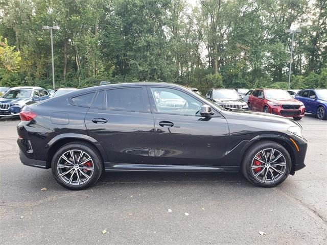 used 2023 BMW X6 car, priced at $58,995