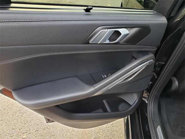 used 2023 BMW X6 car, priced at $58,995