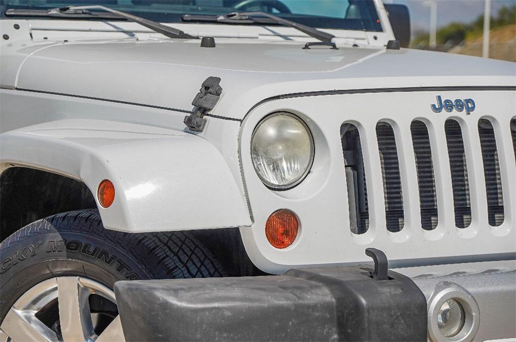 used 2013 Jeep Wrangler Unlimited car, priced at $14,700