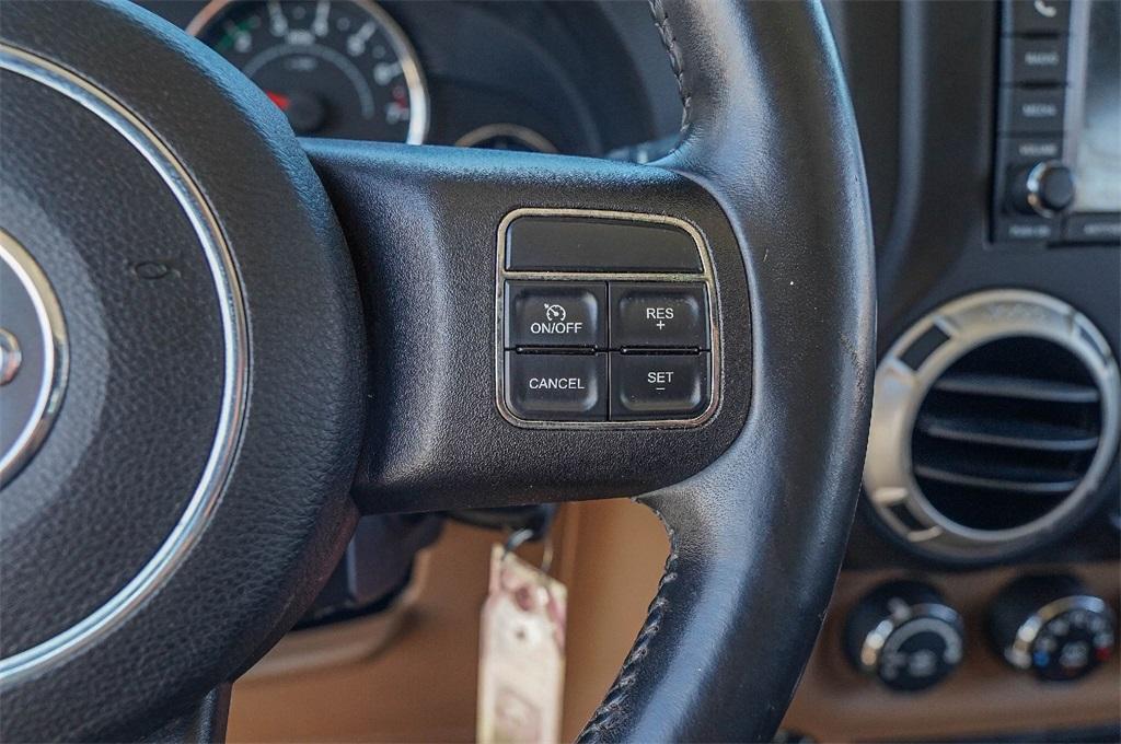 used 2013 Jeep Wrangler Unlimited car, priced at $14,700