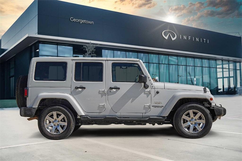 used 2013 Jeep Wrangler Unlimited car, priced at $14,700