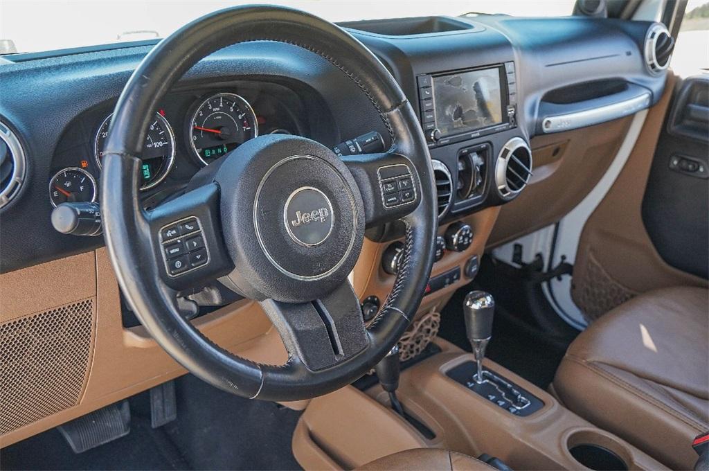 used 2013 Jeep Wrangler Unlimited car, priced at $14,700