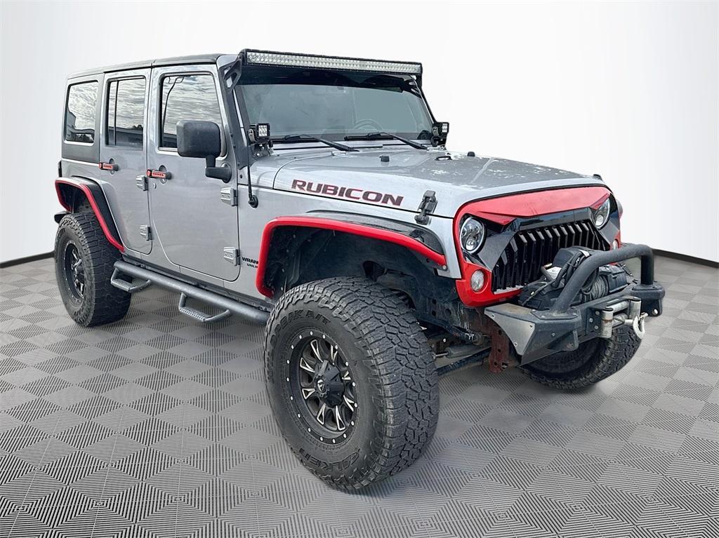 used 2014 Jeep Wrangler Unlimited car, priced at $17,888