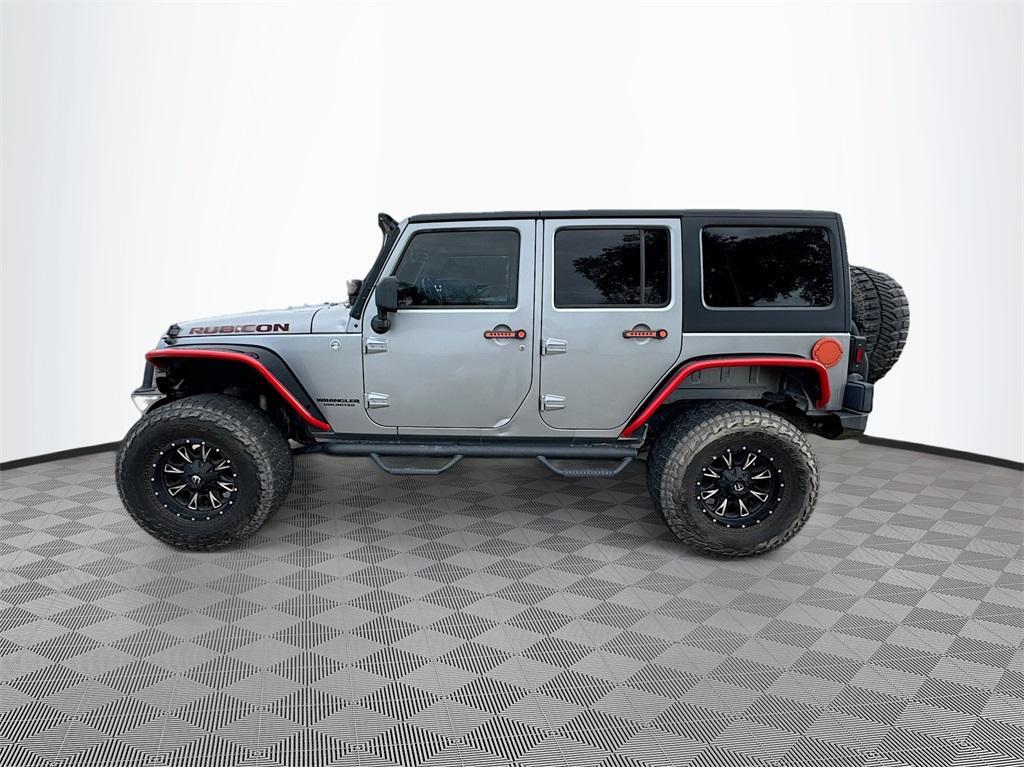 used 2014 Jeep Wrangler Unlimited car, priced at $17,888