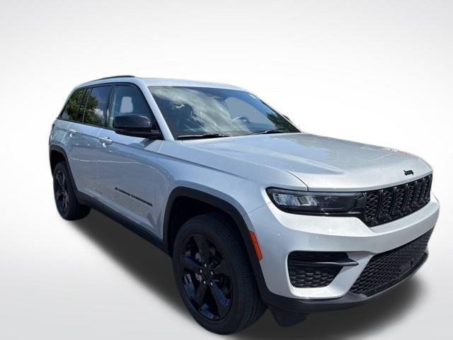 used 2022 Jeep Grand Cherokee car, priced at $33,603