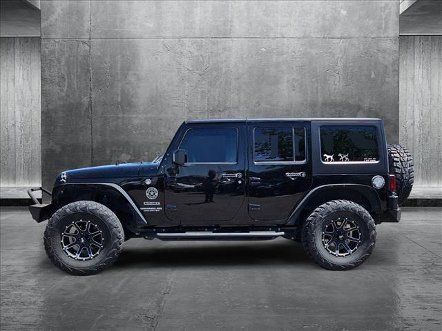 used 2016 Jeep Wrangler Unlimited car, priced at $23,991