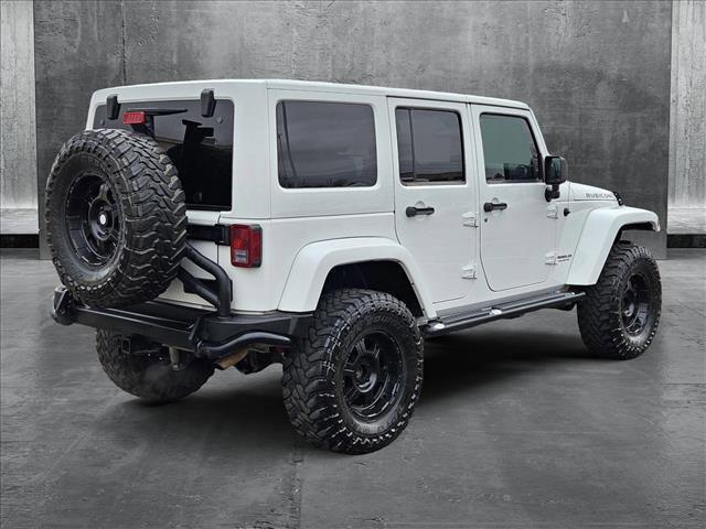 used 2012 Jeep Wrangler Unlimited car, priced at $16,786