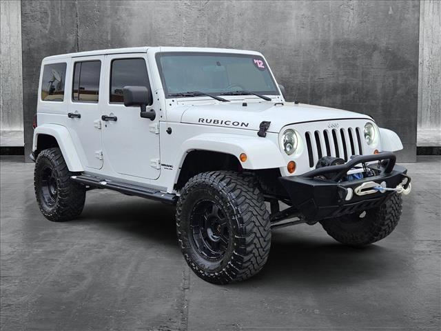 used 2012 Jeep Wrangler Unlimited car, priced at $16,786