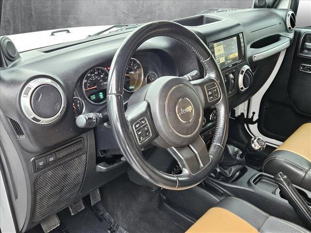 used 2012 Jeep Wrangler Unlimited car, priced at $16,786