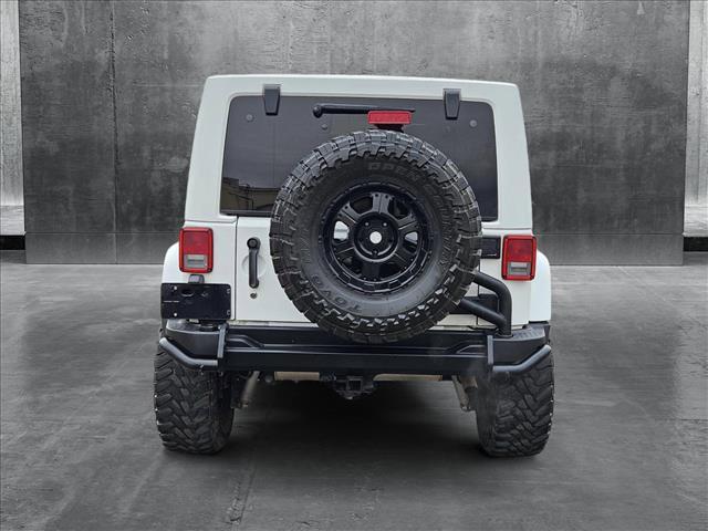 used 2012 Jeep Wrangler Unlimited car, priced at $16,786