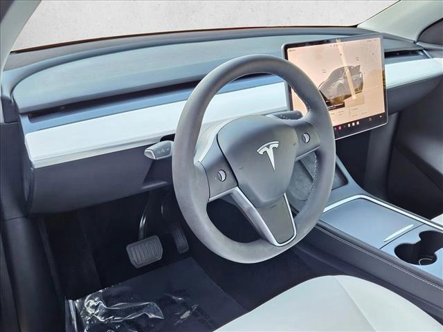 used 2025 Tesla Model Y car, priced at $36,991
