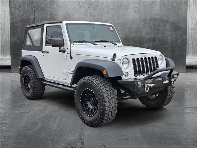 used 2015 Jeep Wrangler car, priced at $17,645