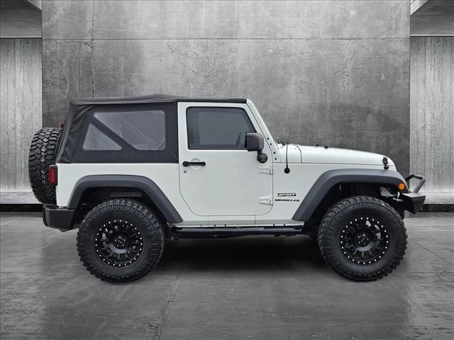 used 2015 Jeep Wrangler car, priced at $17,645