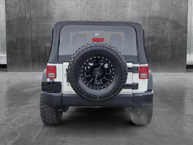 used 2015 Jeep Wrangler car, priced at $17,645