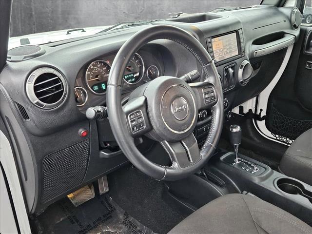 used 2015 Jeep Wrangler car, priced at $17,645