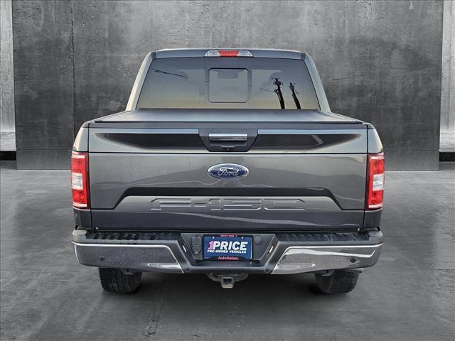 used 2018 Ford F-150 car, priced at $27,003