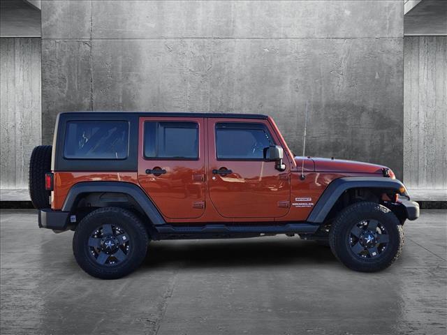 used 2014 Jeep Wrangler Unlimited car, priced at $13,700