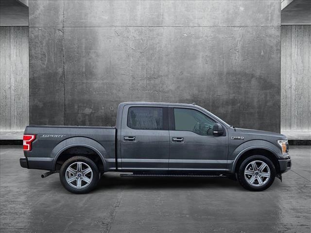 used 2018 Ford F-150 car, priced at $23,044